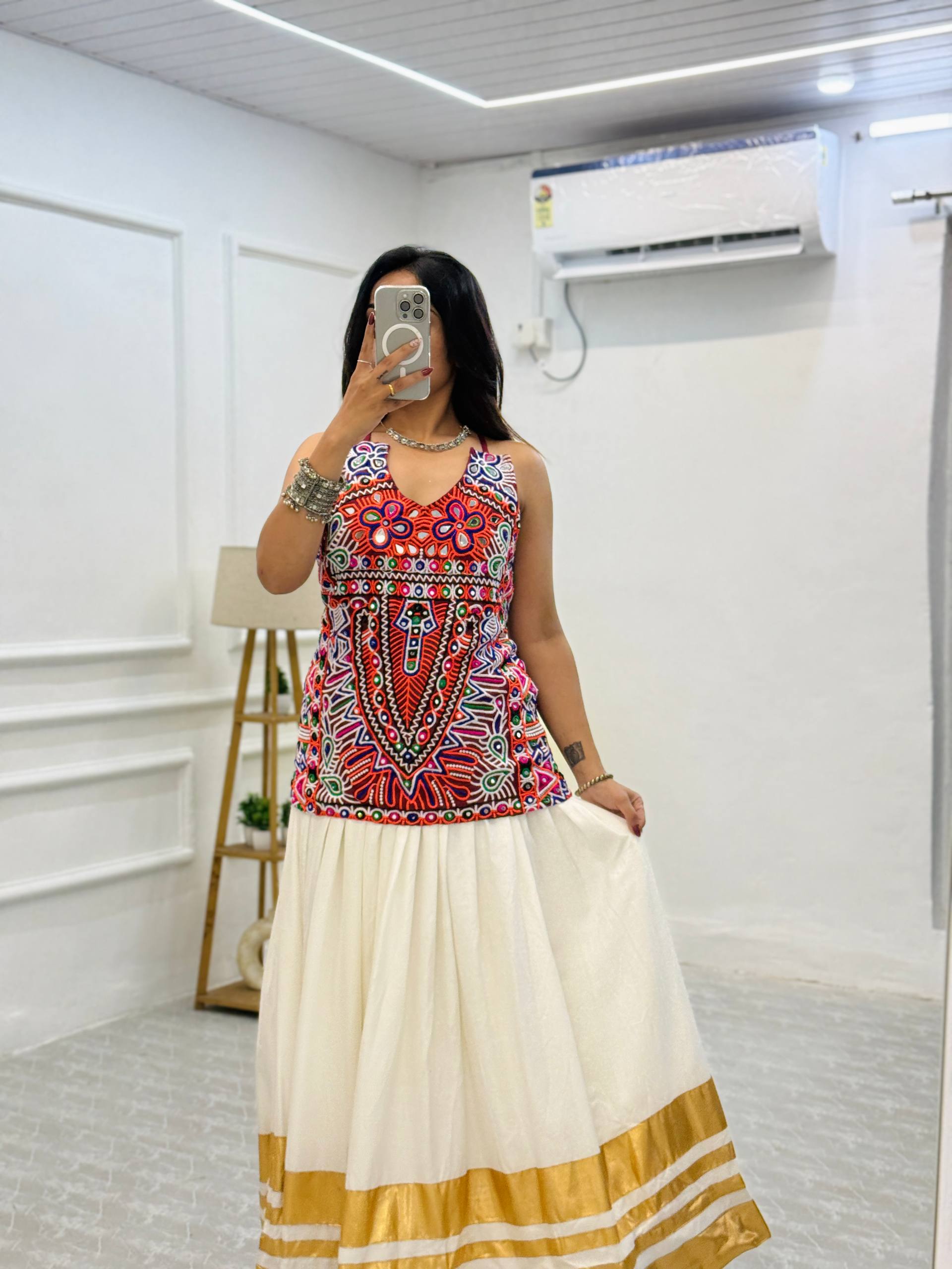 "Traditional White and Gold Lehenga Choli with Vibrant Kutchi Embroidered Blouse"