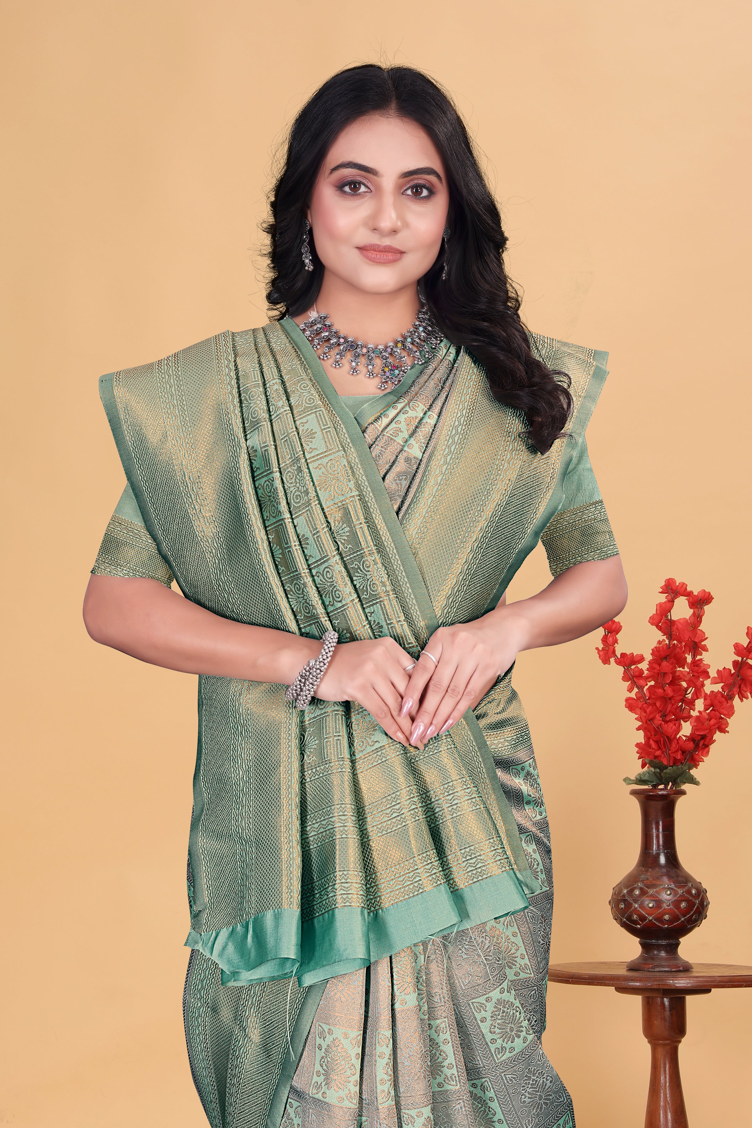 Ethereal Mint Green and Gold Woven Silk Saree