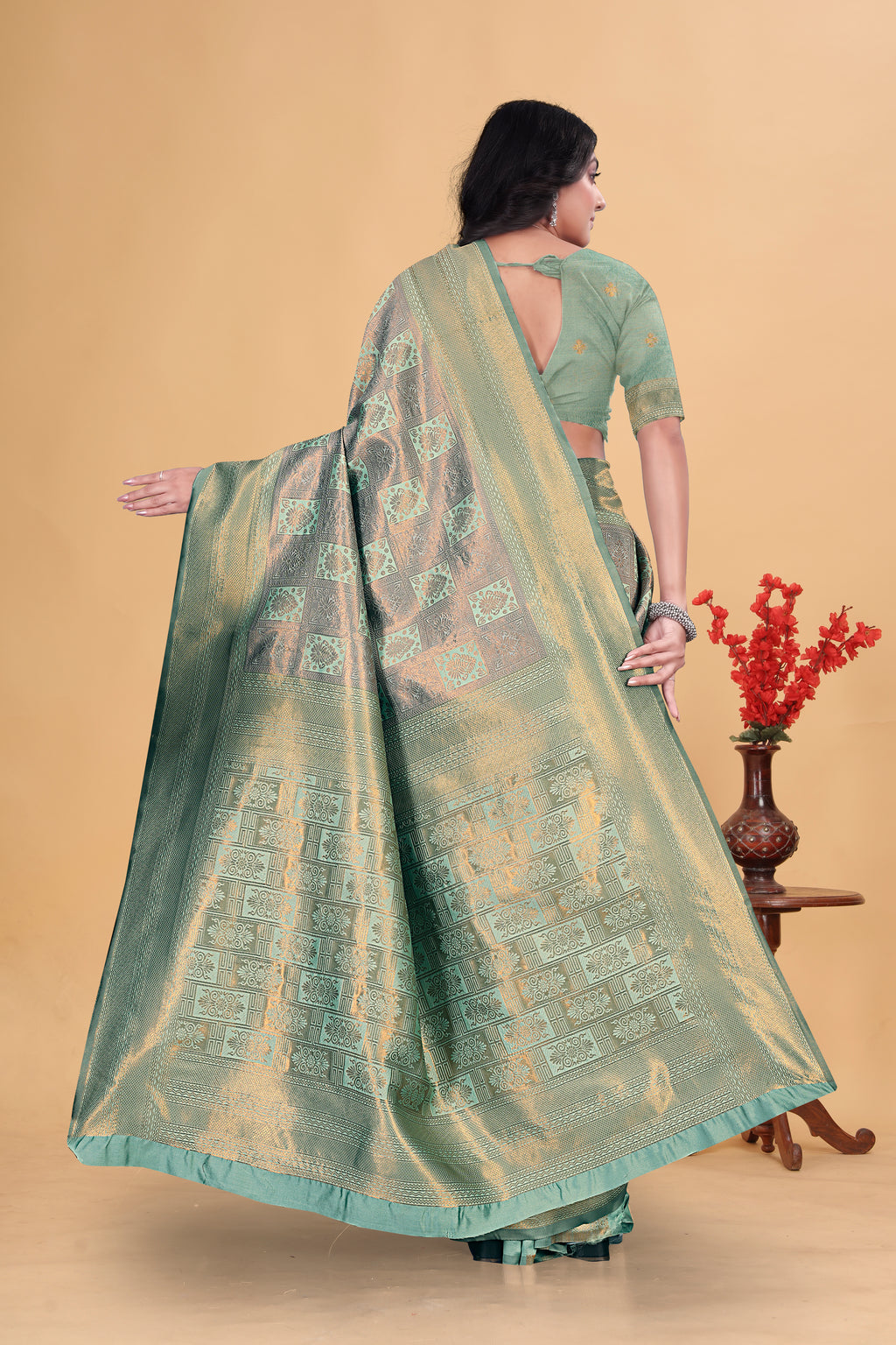 Ethereal Mint Green and Gold Woven Silk Saree