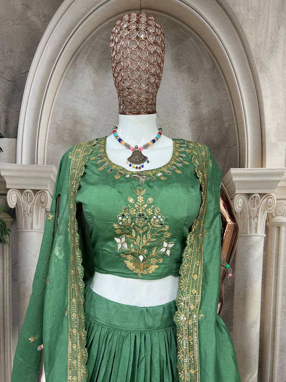 Emerald Green Silk Lehenga Choli with Golden Peacock Embroidery