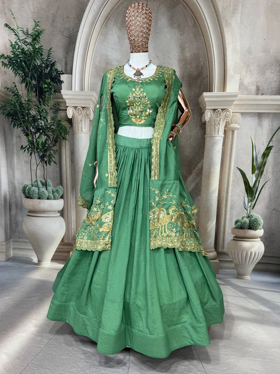 Emerald Green Silk Lehenga Choli with Golden Peacock Embroidery