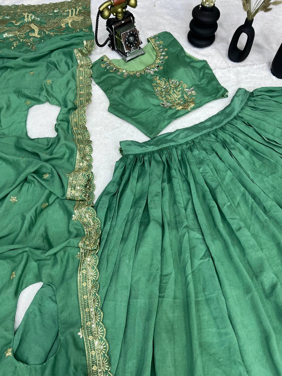 Emerald Green Silk Lehenga Choli with Golden Peacock Embroidery