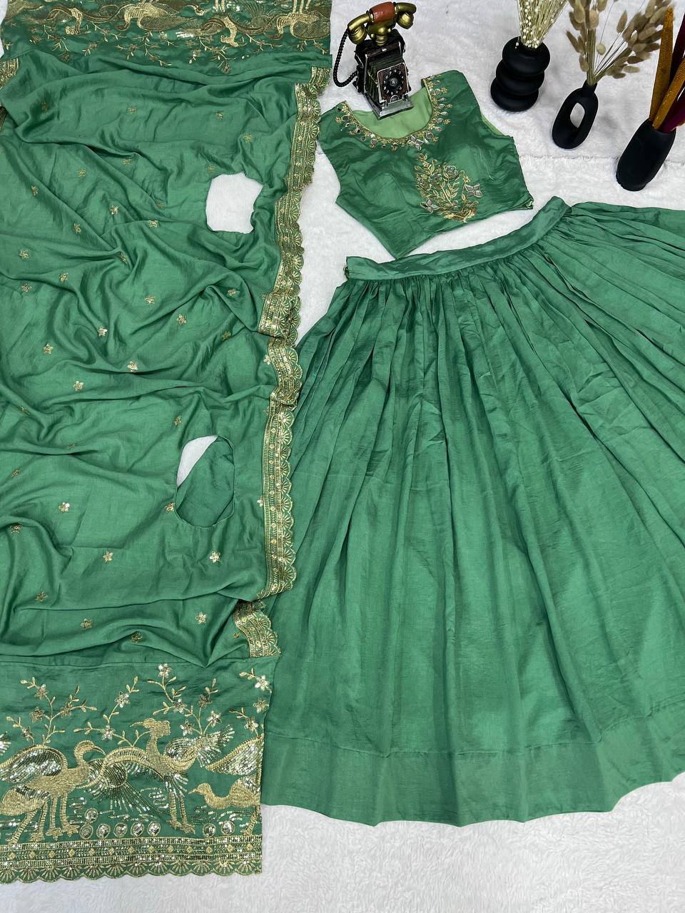 Emerald Green Silk Lehenga Choli with Golden Peacock Embroidery