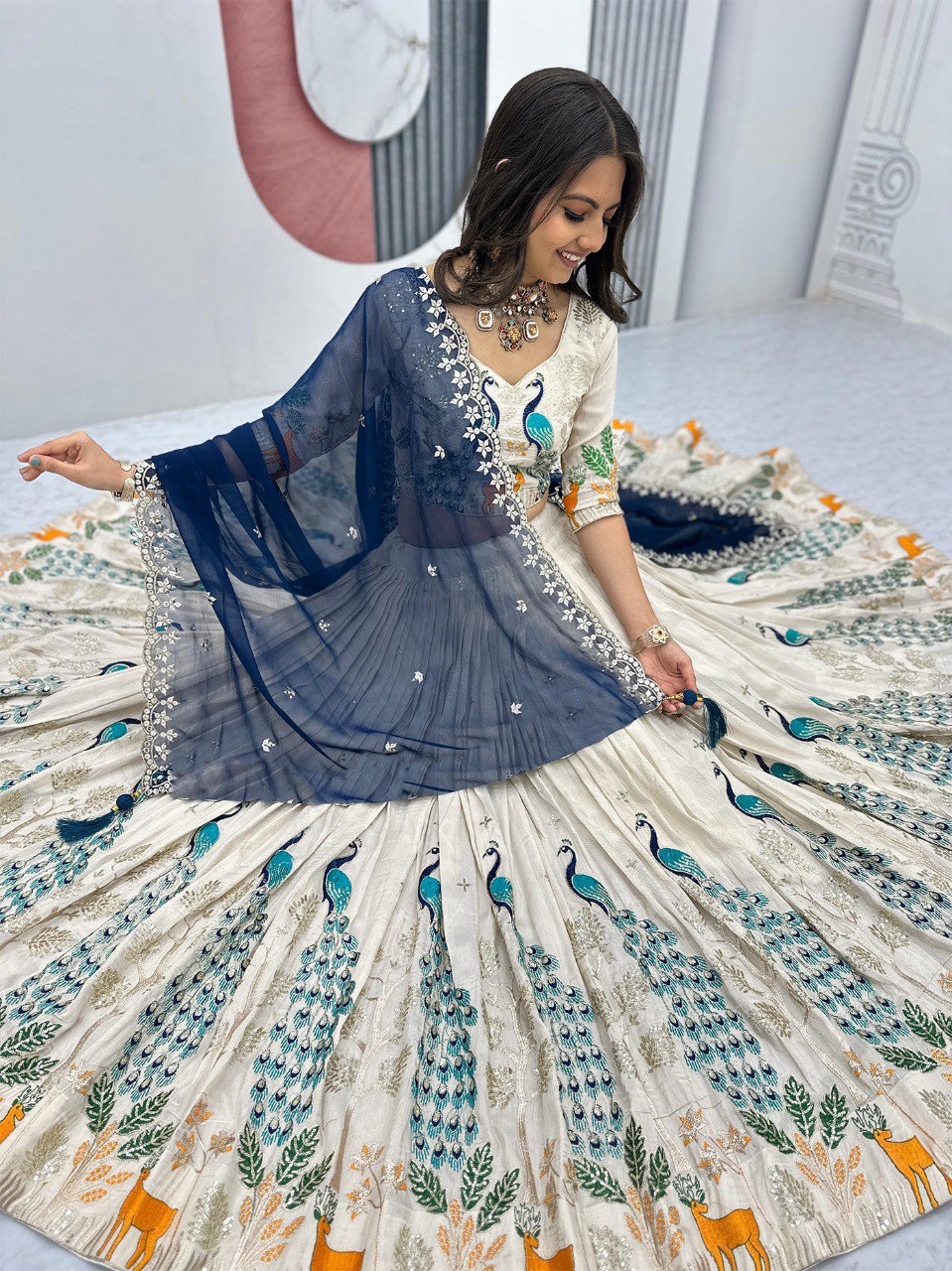 Ivory & Blue Designer Lehenga with Peacock and Deer Embroidery