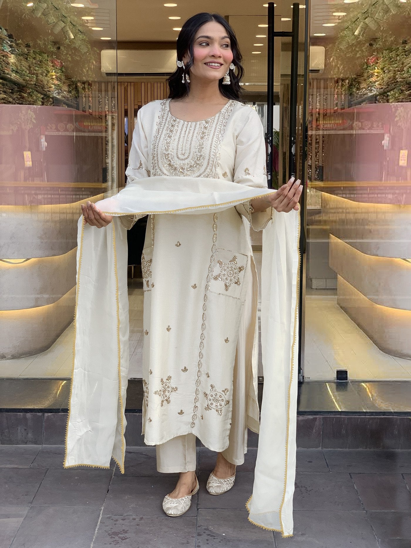 Elegant Cream Kurta Set with Intricate Gold Zari Embroidery and Coordinating Dupatta