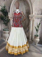 "Traditional White and Gold Lehenga Choli with Vibrant Kutchi Embroidered Blouse"