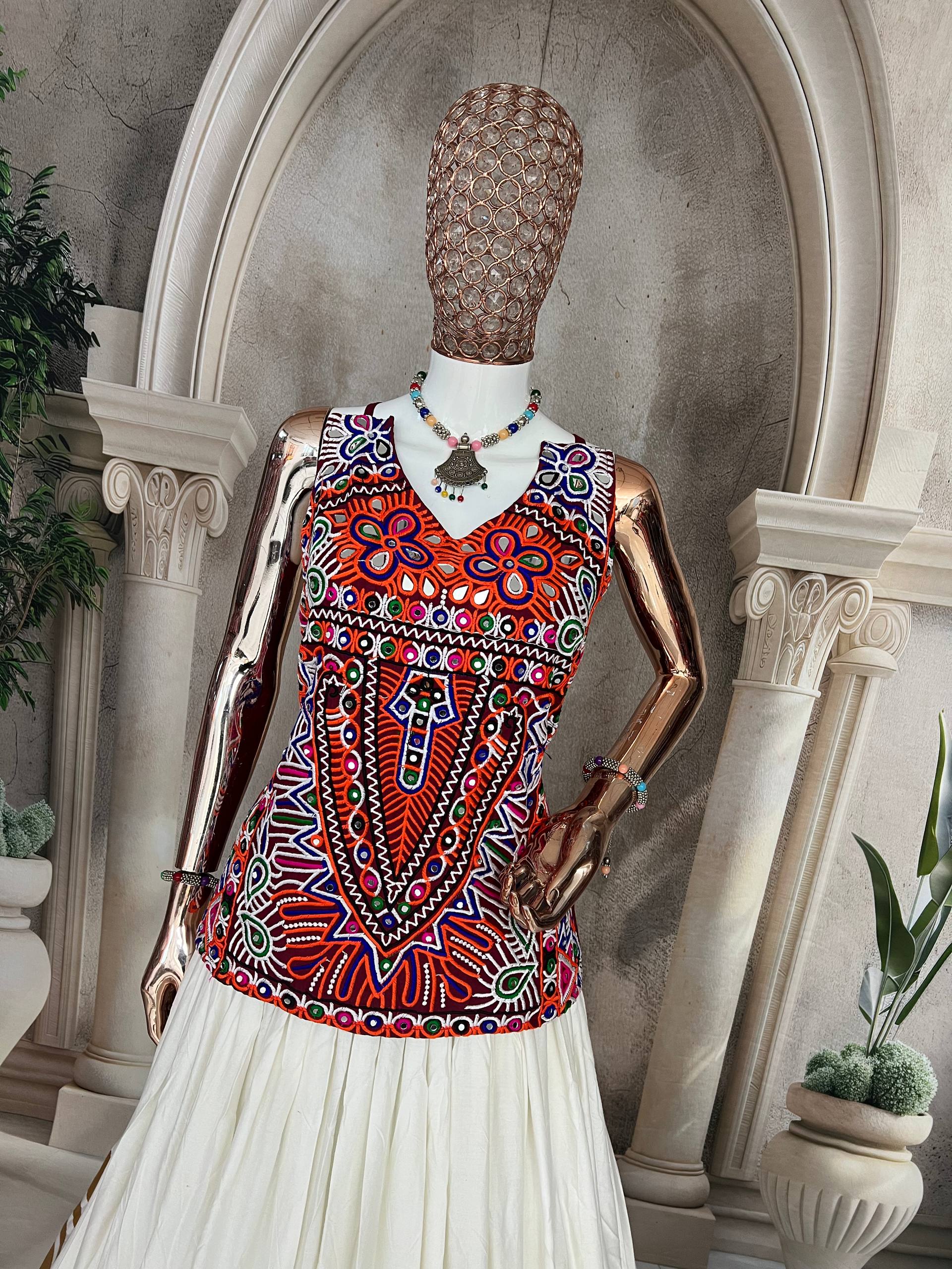 "Traditional White and Gold Lehenga Choli with Vibrant Kutchi Embroidered Blouse"