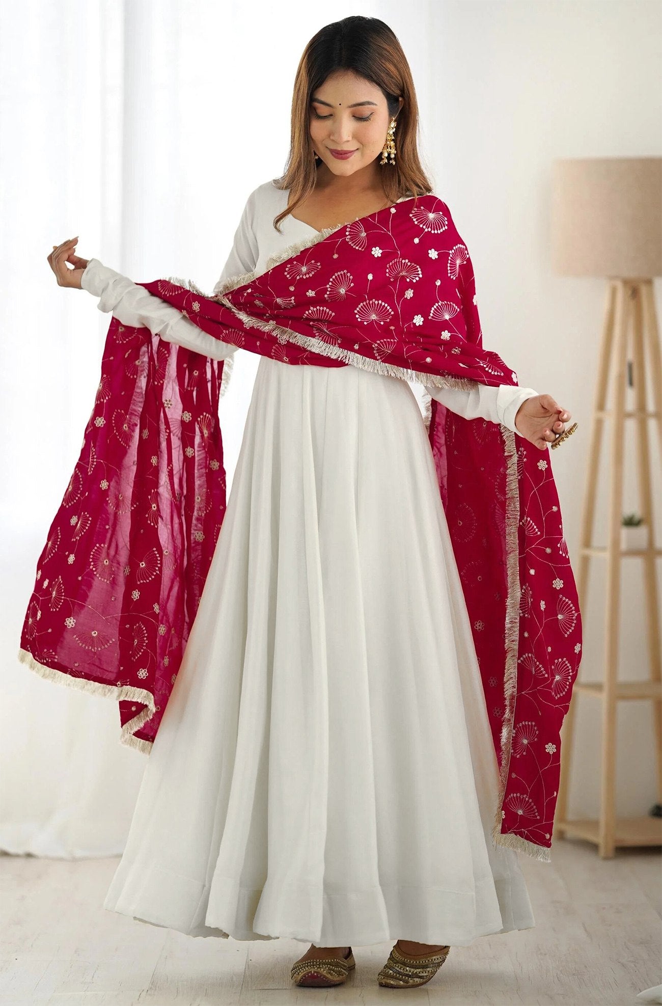 Divine White Flowing Anarkali with Traditional Red Touch
